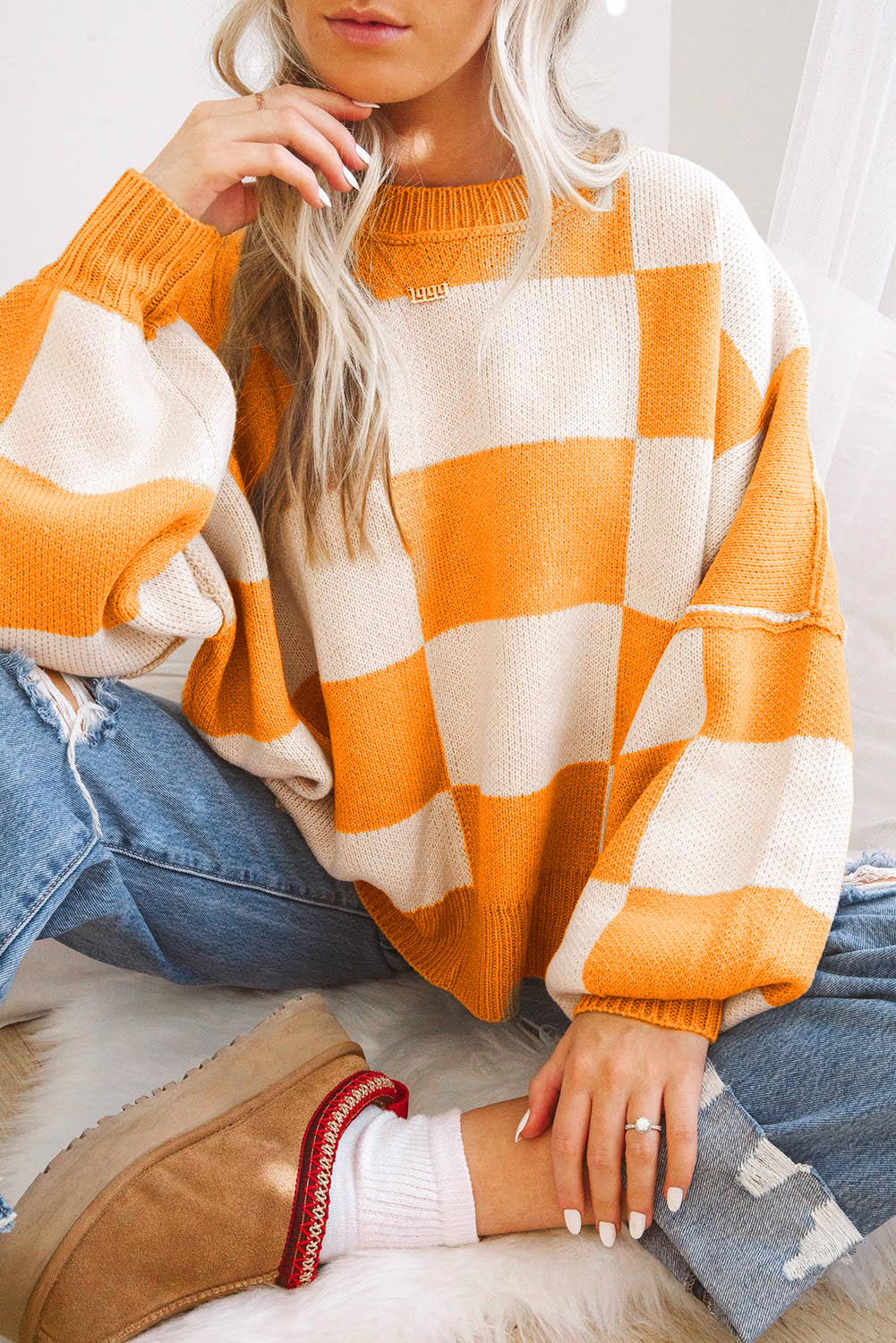 Orange Checkered Bishop-Sleeve Sweater from ARVELA