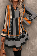 Black Striped Polka Dot V-Neck Mini Dress from ARVELA